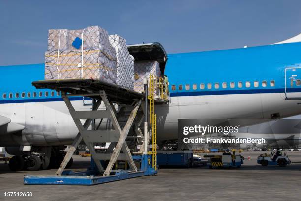 cargo freight loaded into an aircraft - airplane cargo door stock pictures, royalty-free photos & images