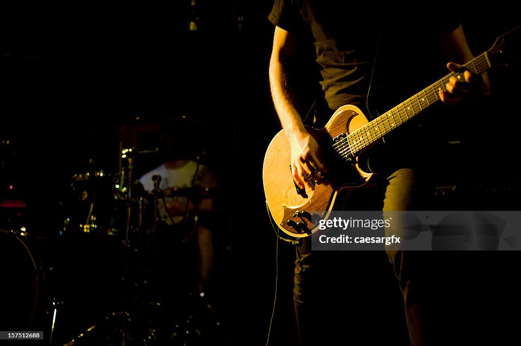 Guitar player close up at a rock show