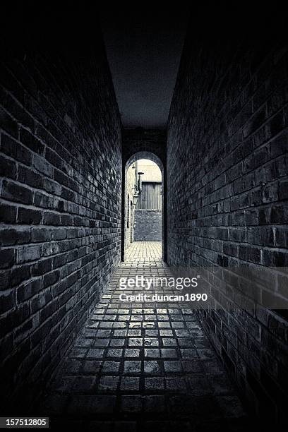 dark alley - claustrophobia stock pictures, royalty-free photos & images