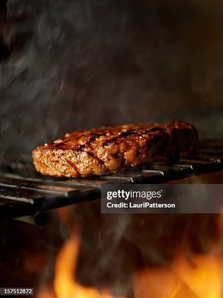 bbq hamburger on the grill - smoking meat stock pictures, royalty-free photos & images