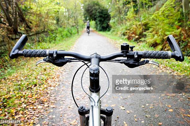 cycling path in autumn - handlebar stock pictures, royalty-free photos & images