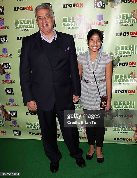 Dick Vega and guest attend "Delhi Safari" - Los Angeles premiere at Pacific Theatre at The Grove on December 3, 2012 in Los Angeles, California.