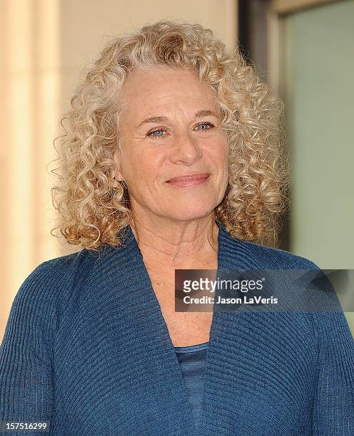 Carole King is honored with a star on the Hollywood Walk of Fame on December 3, 2012 in Hollywood, California.