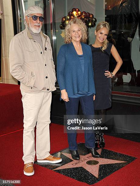 Lou Adler, Carole King and Kristin Chenoweth attend King's induction into the Hollywood Walk of Fame on December 3, 2012 in Hollywood, California.