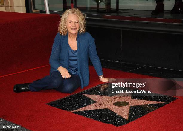 Carole King is honored with a star on the Hollywood Walk of Fame on December 3, 2012 in Hollywood, California.