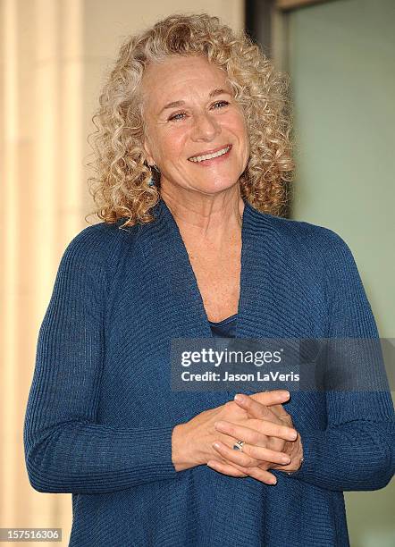 Carole King is honored with a star on the Hollywood Walk of Fame on December 3, 2012 in Hollywood, California.