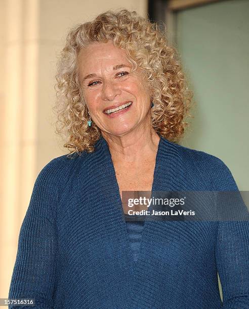 Carole King is honored with a star on the Hollywood Walk of Fame on December 3, 2012 in Hollywood, California.