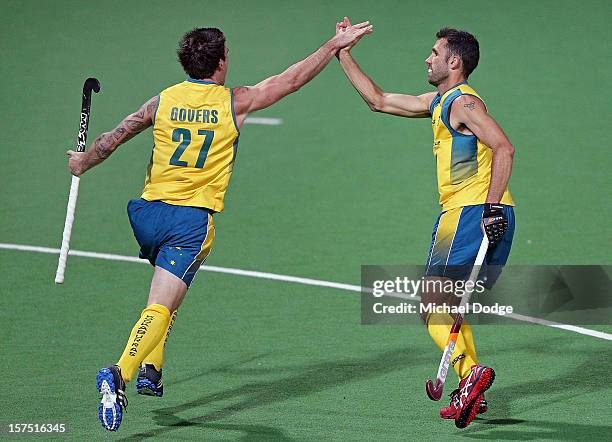 Kieran Govers of Australia scores a goal and celebrates with Mark Knowles of Australia during the match between Australia and Pakistan in day three...