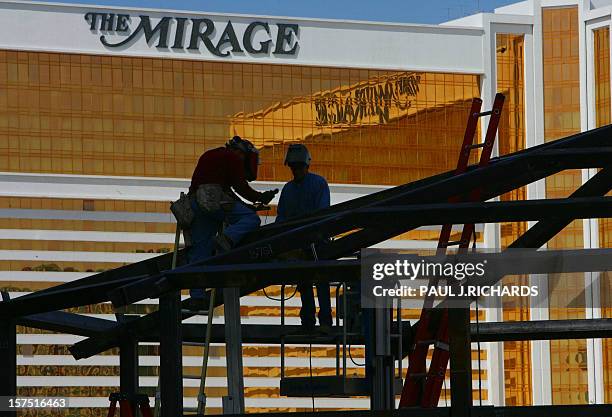 Welders erect a steel frame 05 May 2005, for something new on the property of the Venetian Resort/Hotel/Casino as the Mirage Hotel's gold tinted...