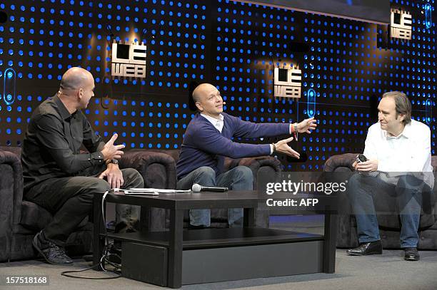 LeWeb co-founder Loic Le Meur and Xavier Niel, Founder of the Iliad Group listen to Tony Fadell, Founder and CEO of Nest Labs, Inc ( during the...