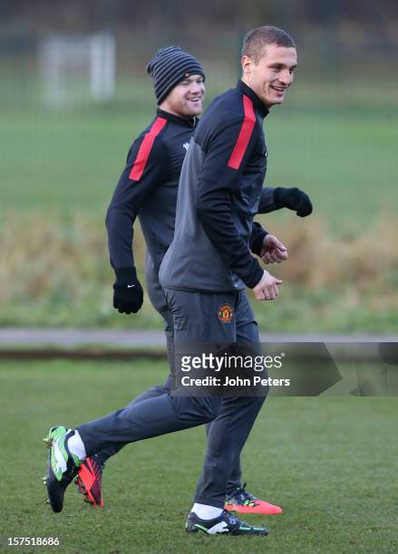 Nemanja Vidic of Manchester United in action during a first team training session, ahead of their UEFA Champions League Group H match against CFR...