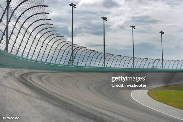 auto racing racetrack turn - motor racing track stock pictures, royalty-free photos & images