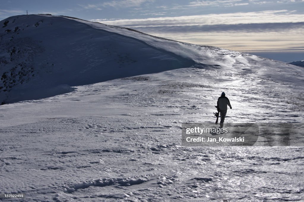 Snowboarder on mountain