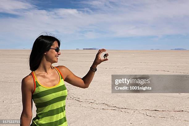 salar de uyuni - forced perspective stock pictures, royalty-free photos & images