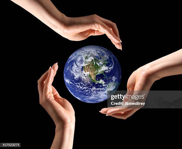 save planet earth, recycle; three hands around ecology globe - james lord stockfoto's en -beelden