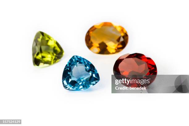 precious gemstones garnet imperial topaz ruby and sapphire - ruby stockfoto's en -beelden