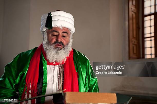 dervish in mosque - senior pastor stockfoto's en -beelden