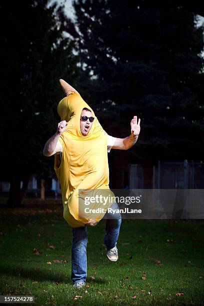 banana suit man dancing - man in costume stock pictures, royalty-free photos & images