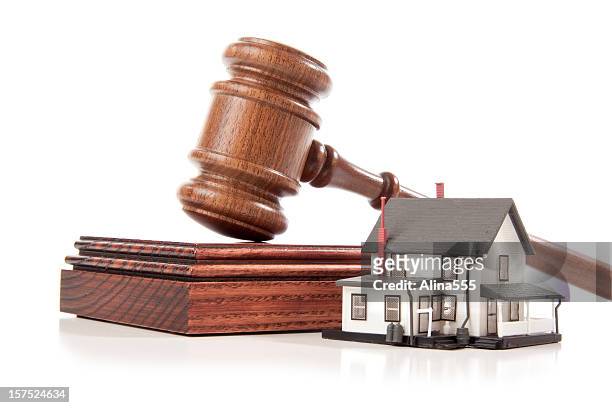gavel and sound block behind a model house on white - auction stock pictures, royalty-free photos & images