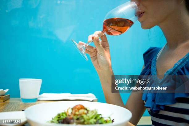 drinking wine - half underwater stockfoto's en -beelden