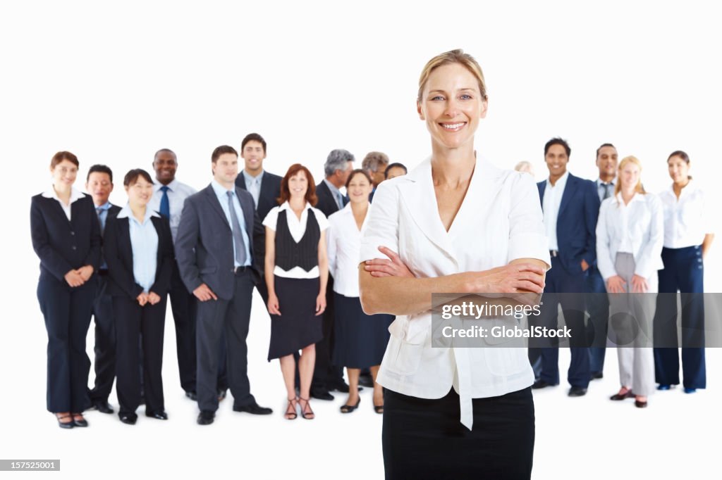 Business woman with colleagues at the back