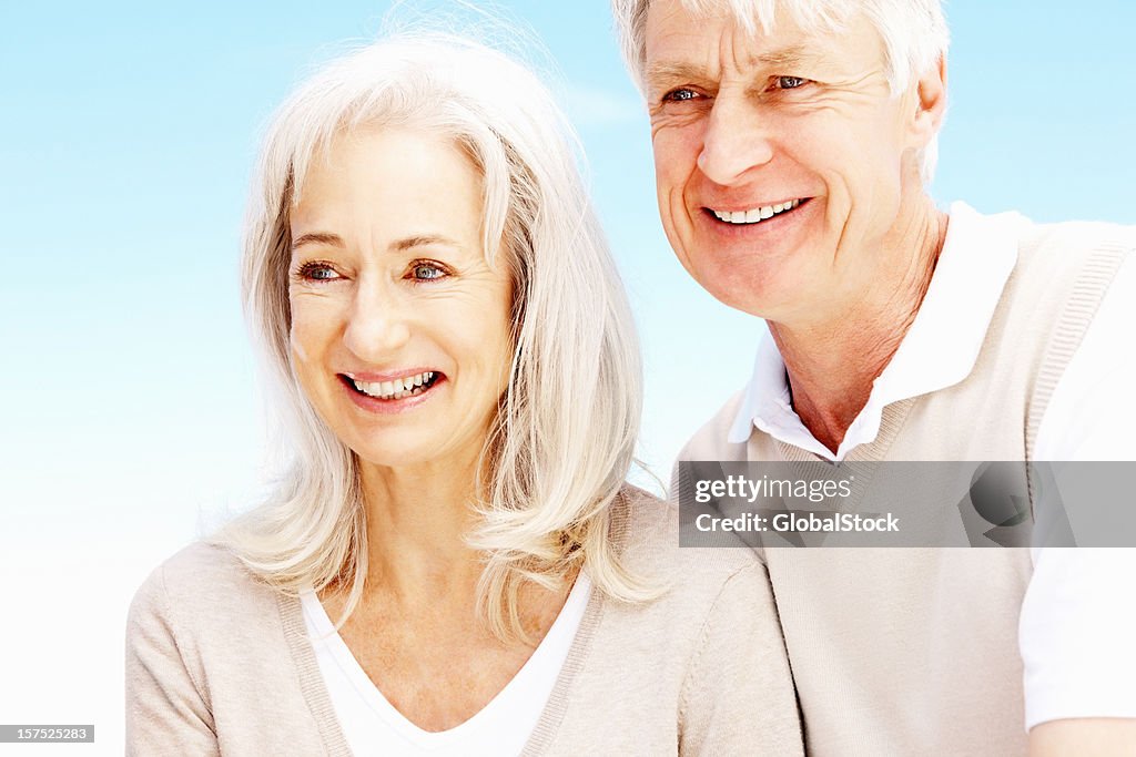 Senior couple looking away
