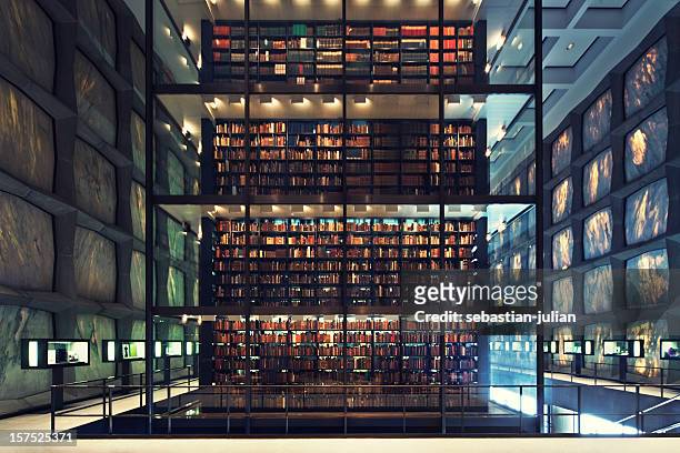 postmodern library - books on shelf stockfoto's en -beelden