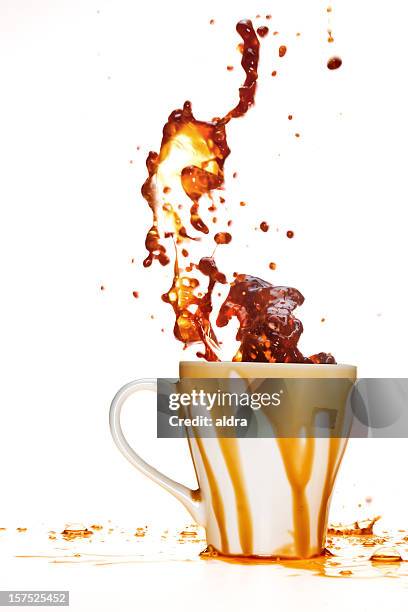 coffee splash - overlopen stockfoto's en -beelden