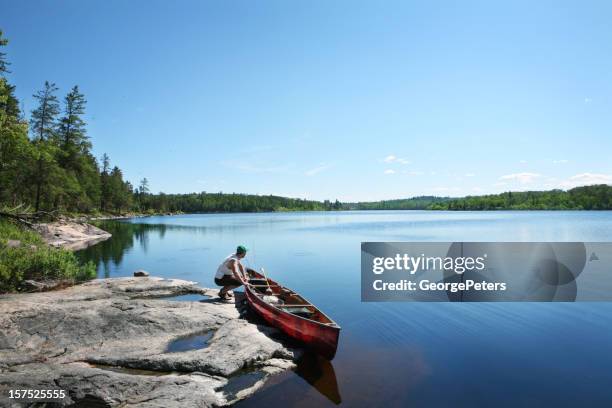 going fishing on a wilderness lake - boundary waters canoe area stockfoto's en -beelden
