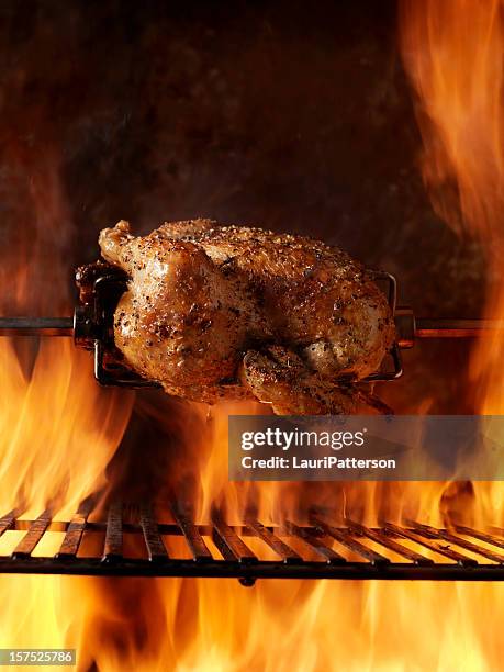 roast chicken on the bbq - rotisserie stock pictures, royalty-free photos & images