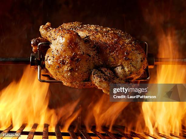 roast chicken on the bbq - rotisserie stock pictures, royalty-free photos & images