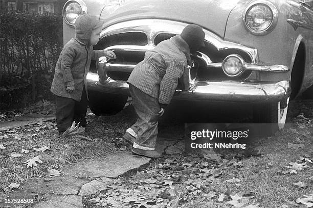 boys inspecting packard coupe car 1955, retro - 1955 stock pictures, royalty-free photos & images