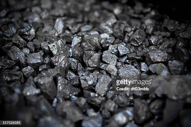 small pieces of strong metal ore - mining natural resources stock pictures, royalty-free photos & images