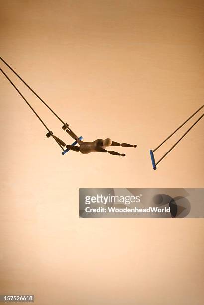 trapeze acrobat - trapeze artist stock pictures, royalty-free photos & images