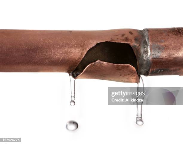 broken copper pipe slow drip - burst pipe stock pictures, royalty-free photos & images