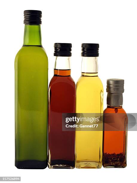 olive oil and vinegar bottles on white - vinegar stockfoto's en -beelden