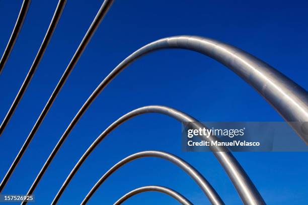 metallic arches - pointy architecture stock pictures, royalty-free photos & images