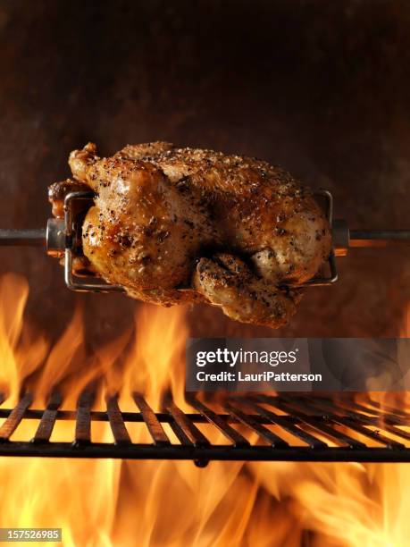 roast chicken on the bbq - rotisserie stock pictures, royalty-free photos & images