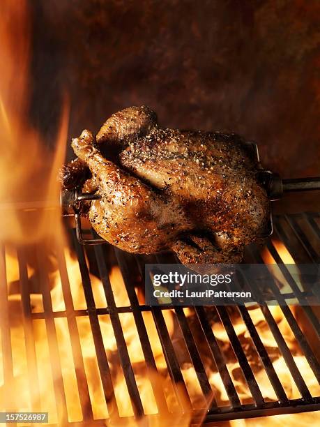 roast chicken on the bbq - rotisserie stock pictures, royalty-free photos & images