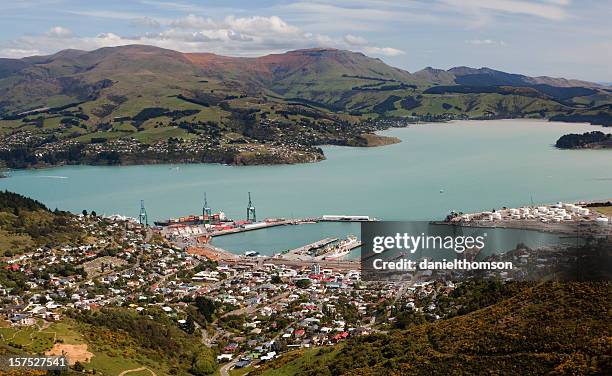 aerial view of the town of lyttelton, cantebury in nz - christchurch stockfoto's en -beelden