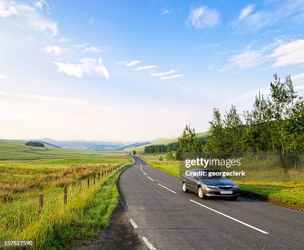 early morning drive - car on road stock pictures, royalty-free photos & images