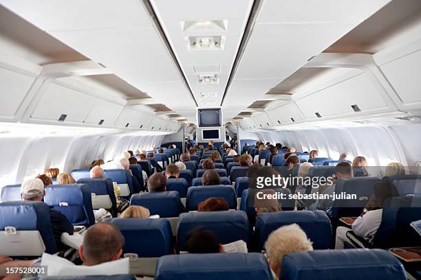 flugzeuge im innen - aisle seat airline stock-fotos und bilder