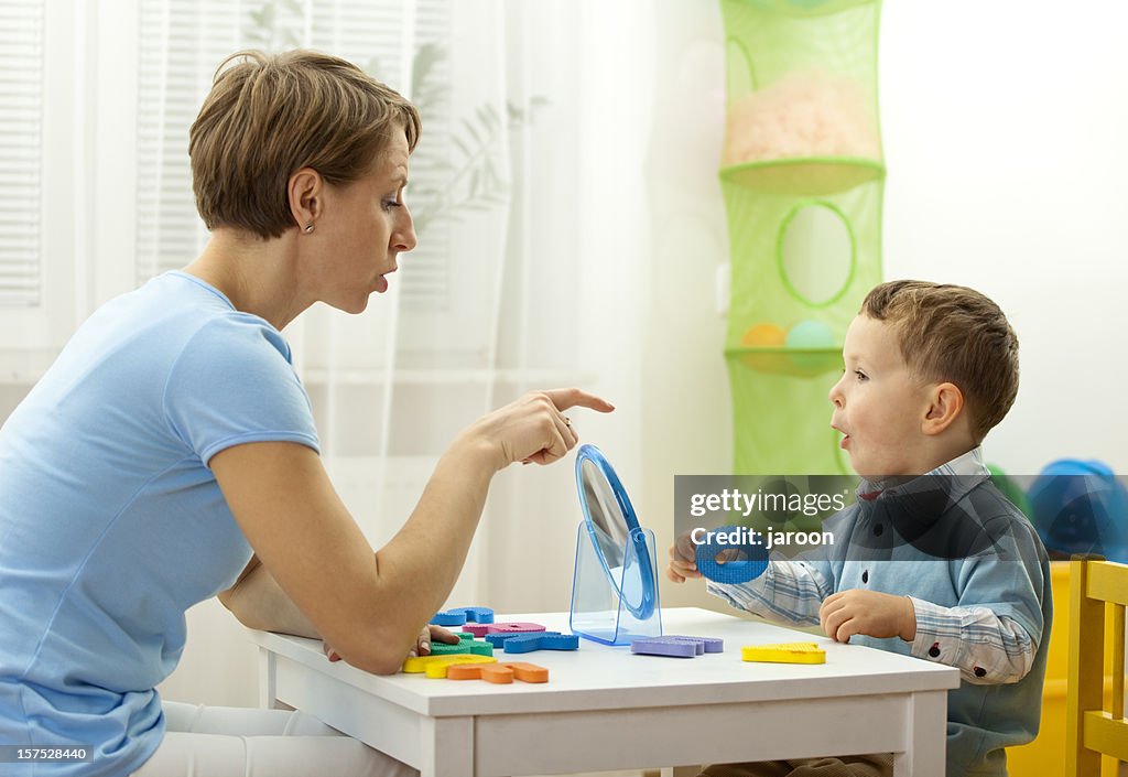 Speech therapist with child