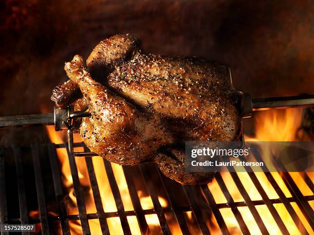 roast chicken on the bbq - rotisserie stock pictures, royalty-free photos & images