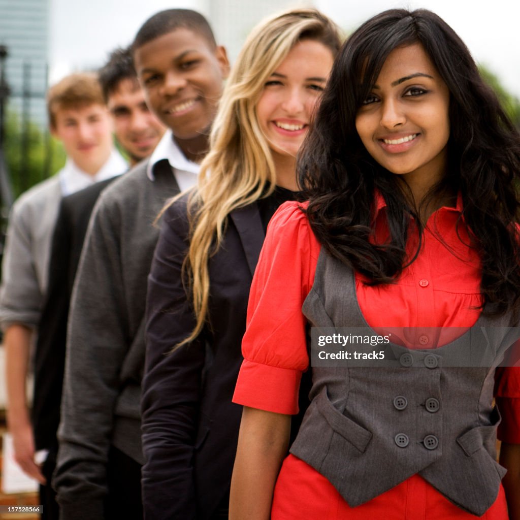 Further education: teenagers standing in a row