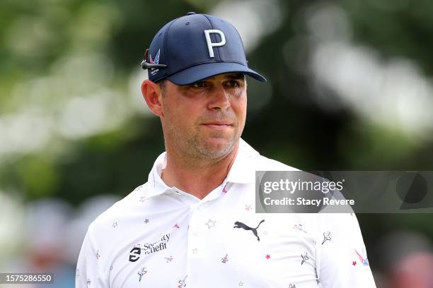 Gary Woodland of the United States watches his tee shot on the eighth hole during the first round of the 3M Open at TPC Twin Cities on July 27, 2023...