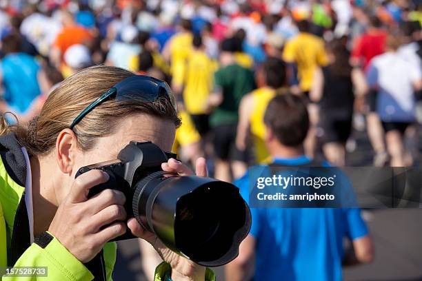 taking pictures at marathon - sports photographer stock pictures, royalty-free photos & images