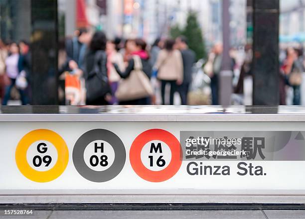 outside ginza station in tokyo - ginza metro station entrance stock pictures, royalty-free photos & images