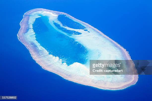 coral atoll - kimberley boat stock pictures, royalty-free photos & images