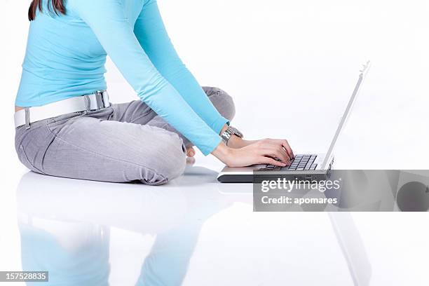 using laptop - legs crossed at knee slim stock pictures, royalty-free photos & images